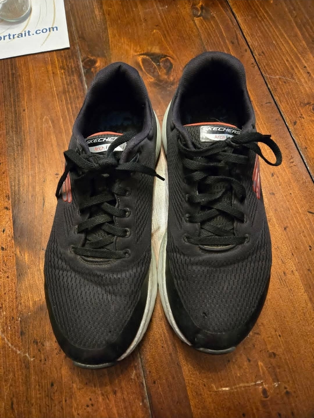 Skechers Men’s Black Sneakers with Red Accent